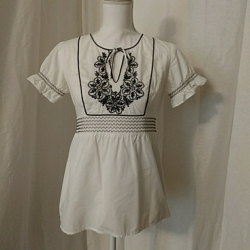 Shirred Detail and Embroidered Peplum Top
