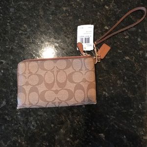 Brown coach wristlet