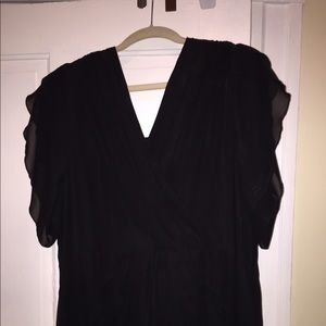 Roman's black dress