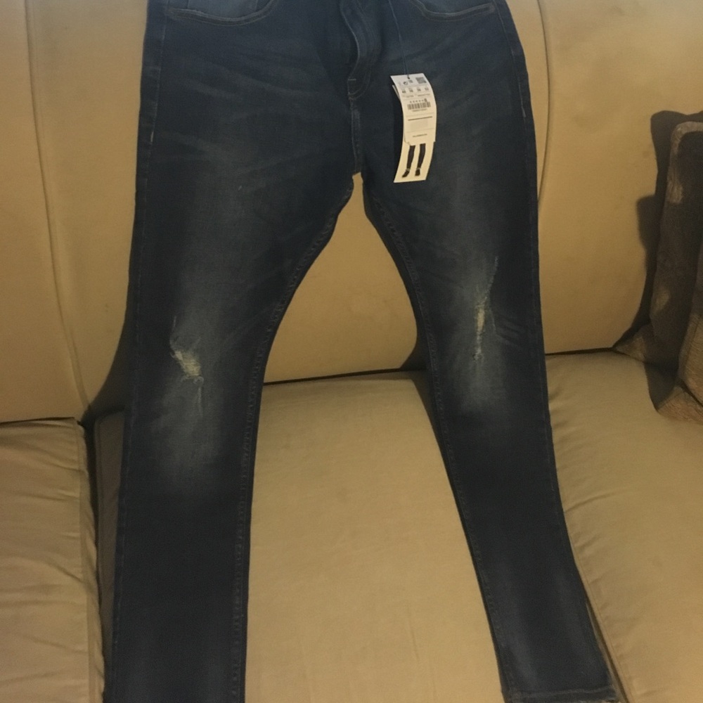 Pull and Bear mid rinse jeans with abrasive rips