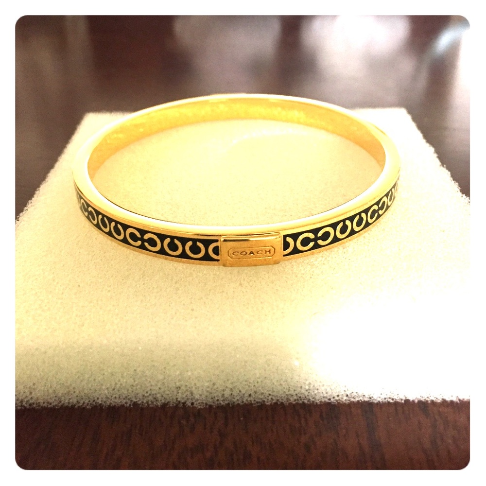 Coach gold and black bracelet