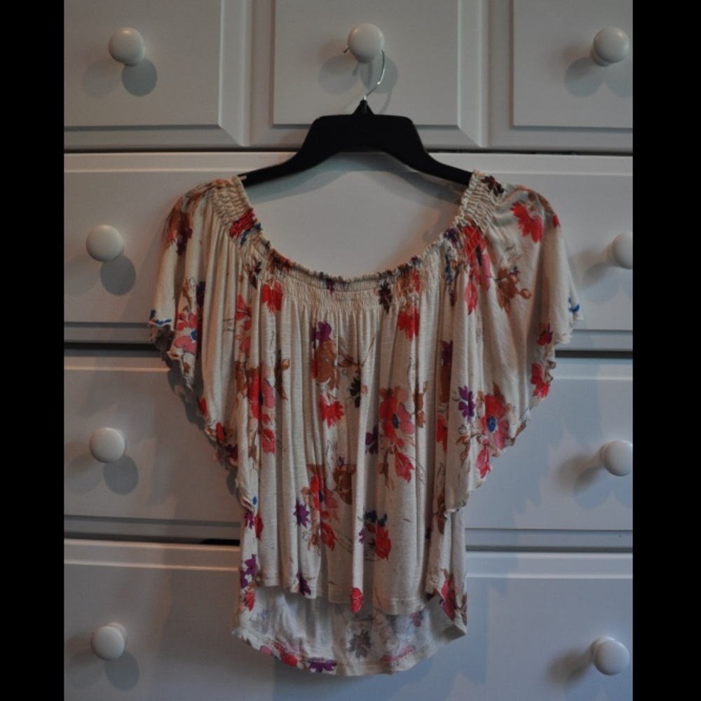 Flouncy cream and floral patterned shirt