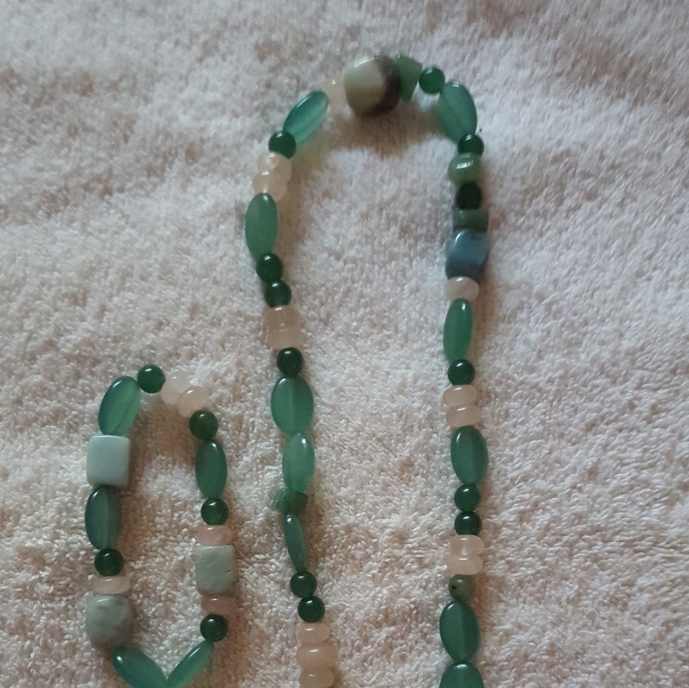 Necklace and bracelet made out of rocks.