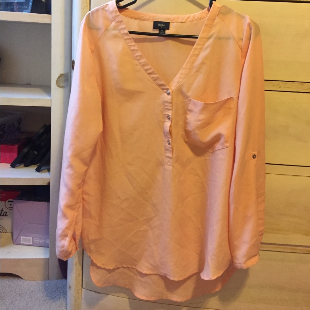 Coral colored blouse