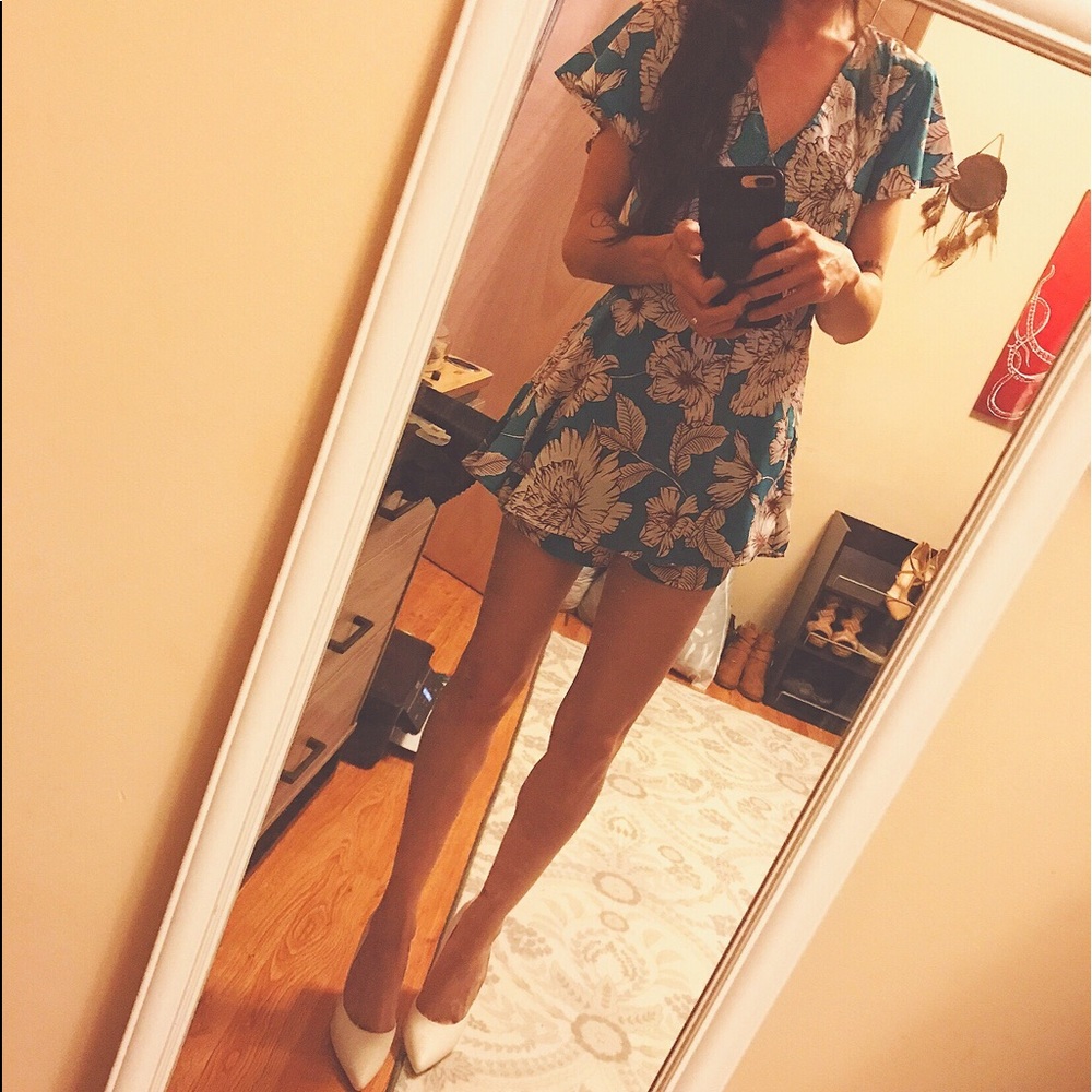 Blue floral print skirted romper