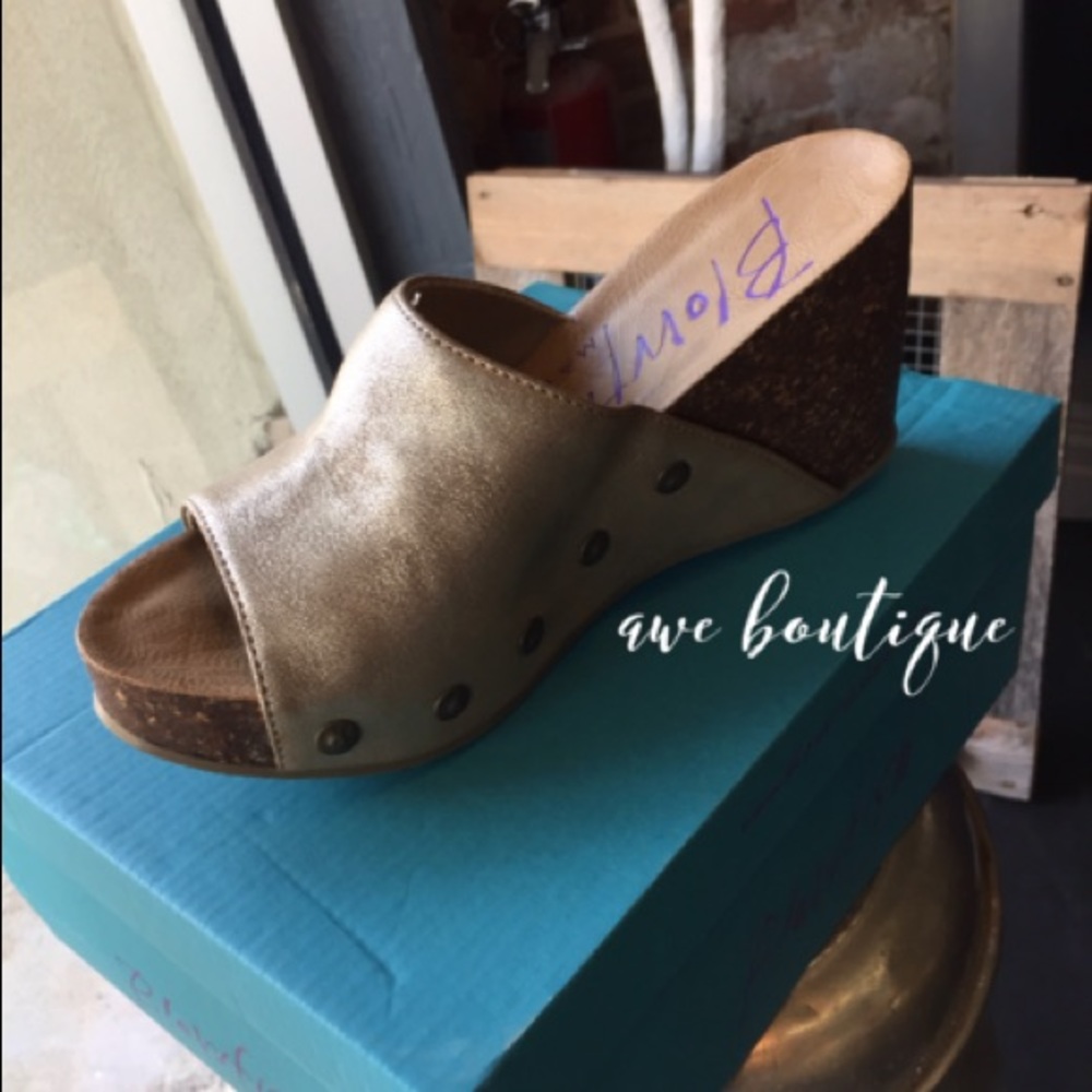 Gold Slip-On Wedges.