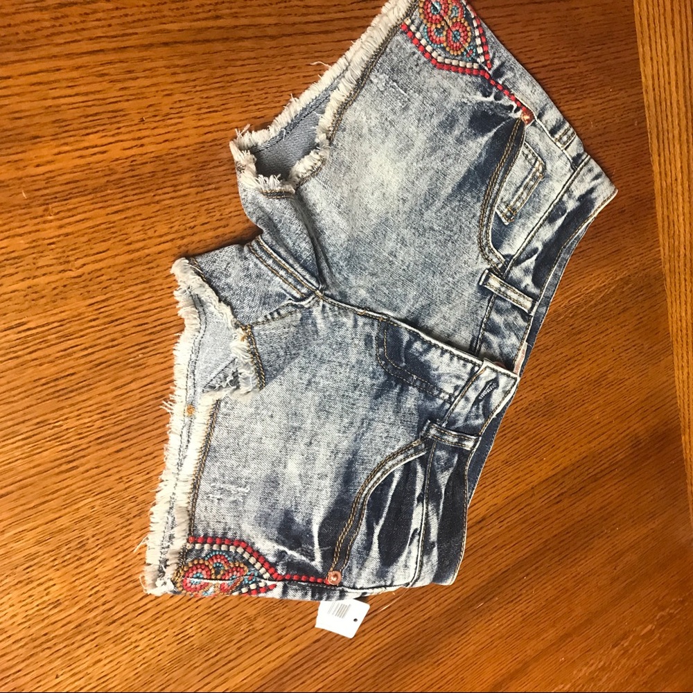 Jean shorts with design on sides