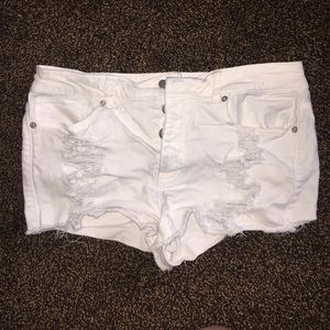 Distressed white shorts