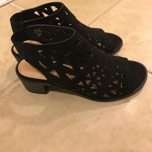 Black low heeled sandals.