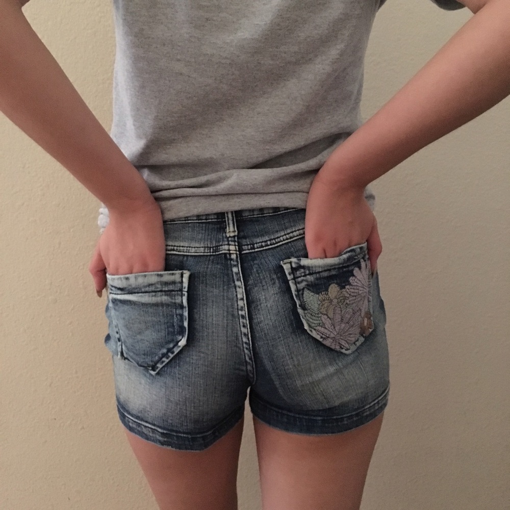 Distressed denim shorts