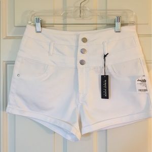 New white high-waisted shorts