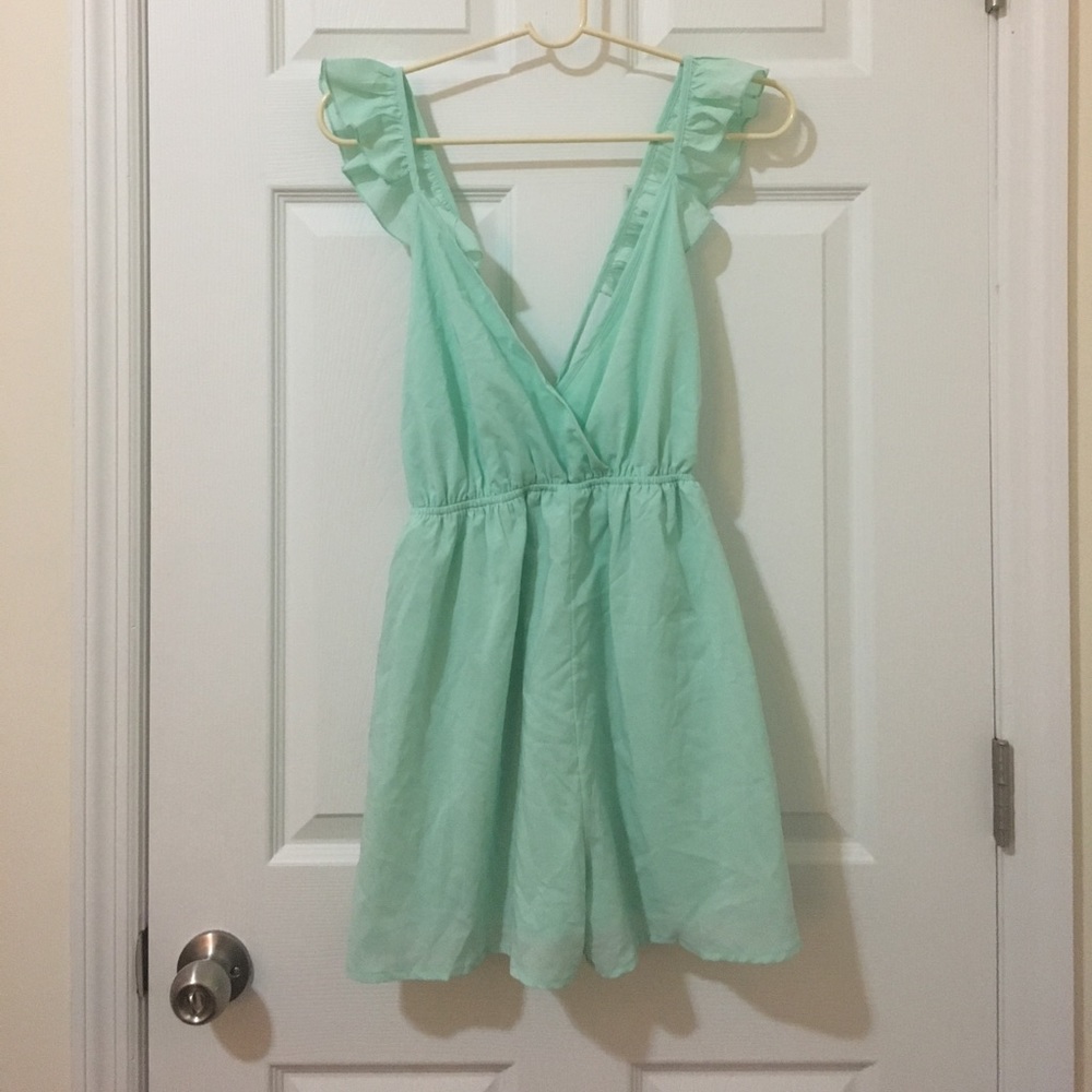 Ruffle shoulder romper from Nasty Gal size S