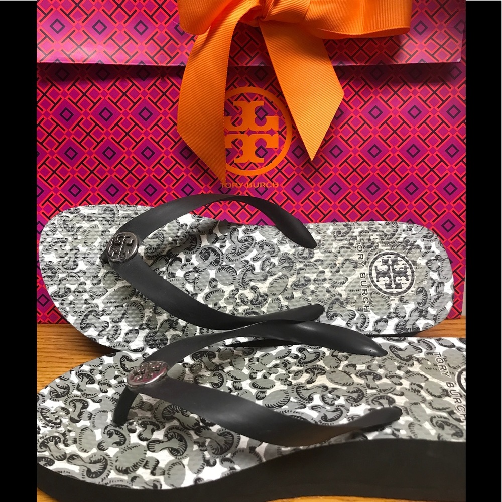 Tory Burch wedge flip flops.