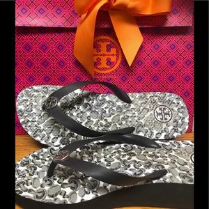 Tory Burch wedge flip flops.