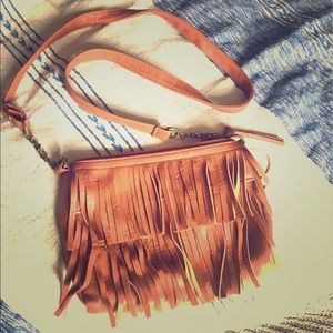 Small brown fringe purse.