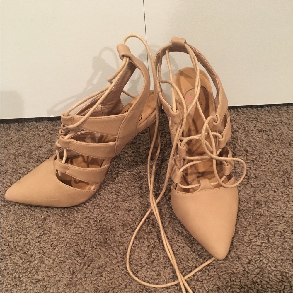 Nude lace up pumps