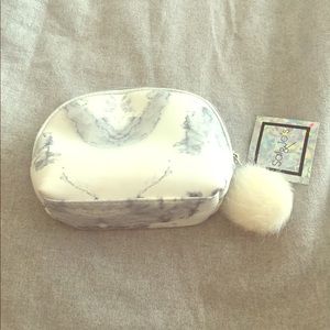 Marbled cosmetic bag with Pom pom
