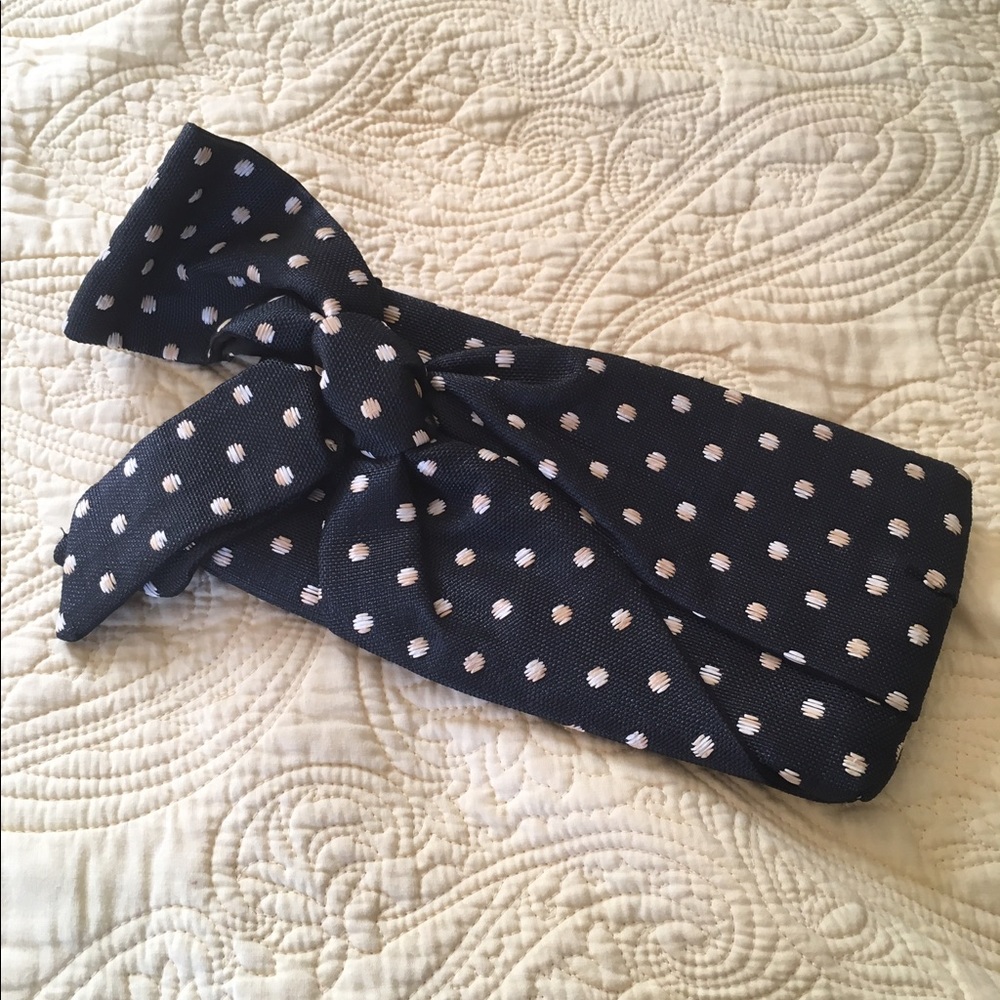 Polka-dot Valentino bow clutch