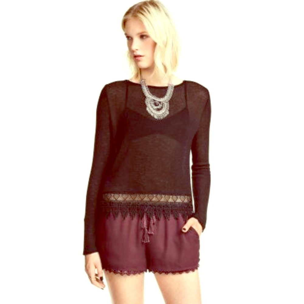 Black fine knit sweater with crochet lace trim