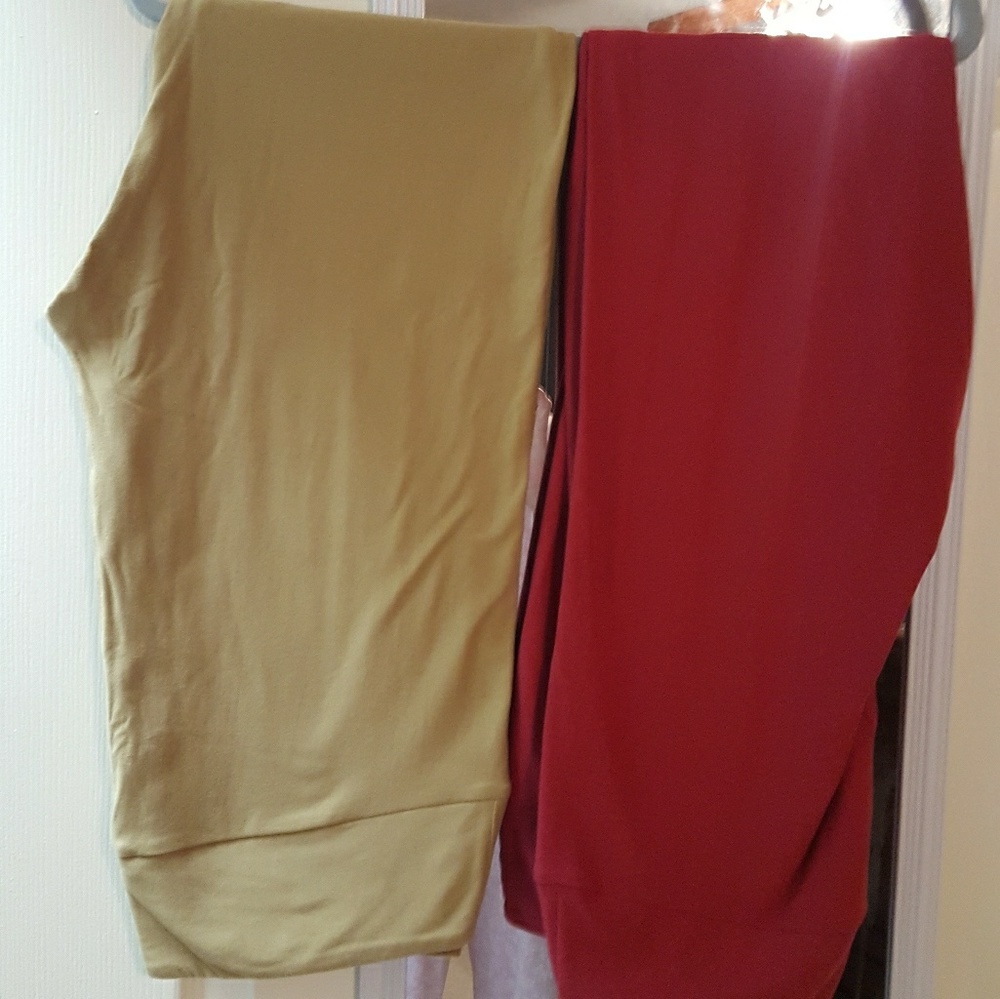 Two pair of women's leggings.  Priced separately.