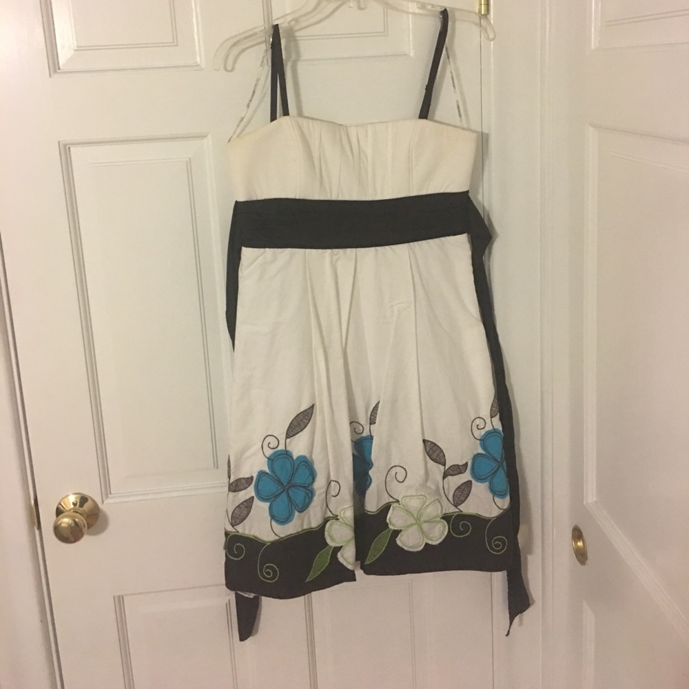 Brown and white dress with blue flowers