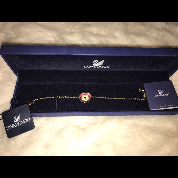 Swarovski Jewelry - Swarovski flower charm bracelet
