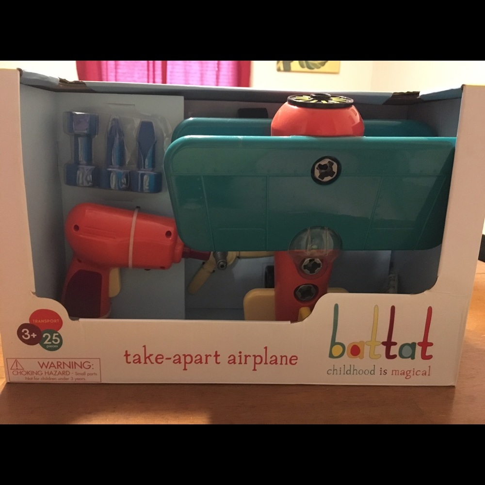 Toddler build it airplane.