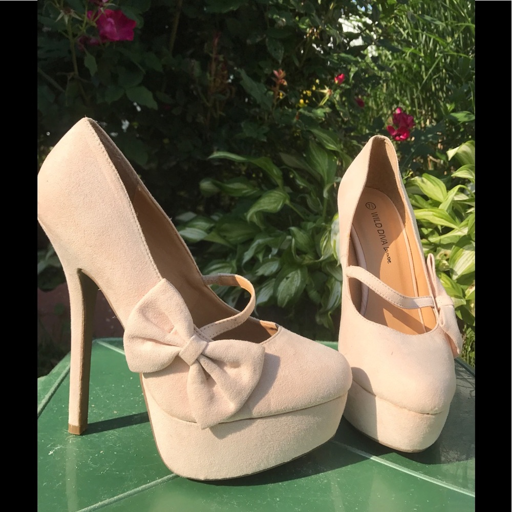 Cream colored suede pumps