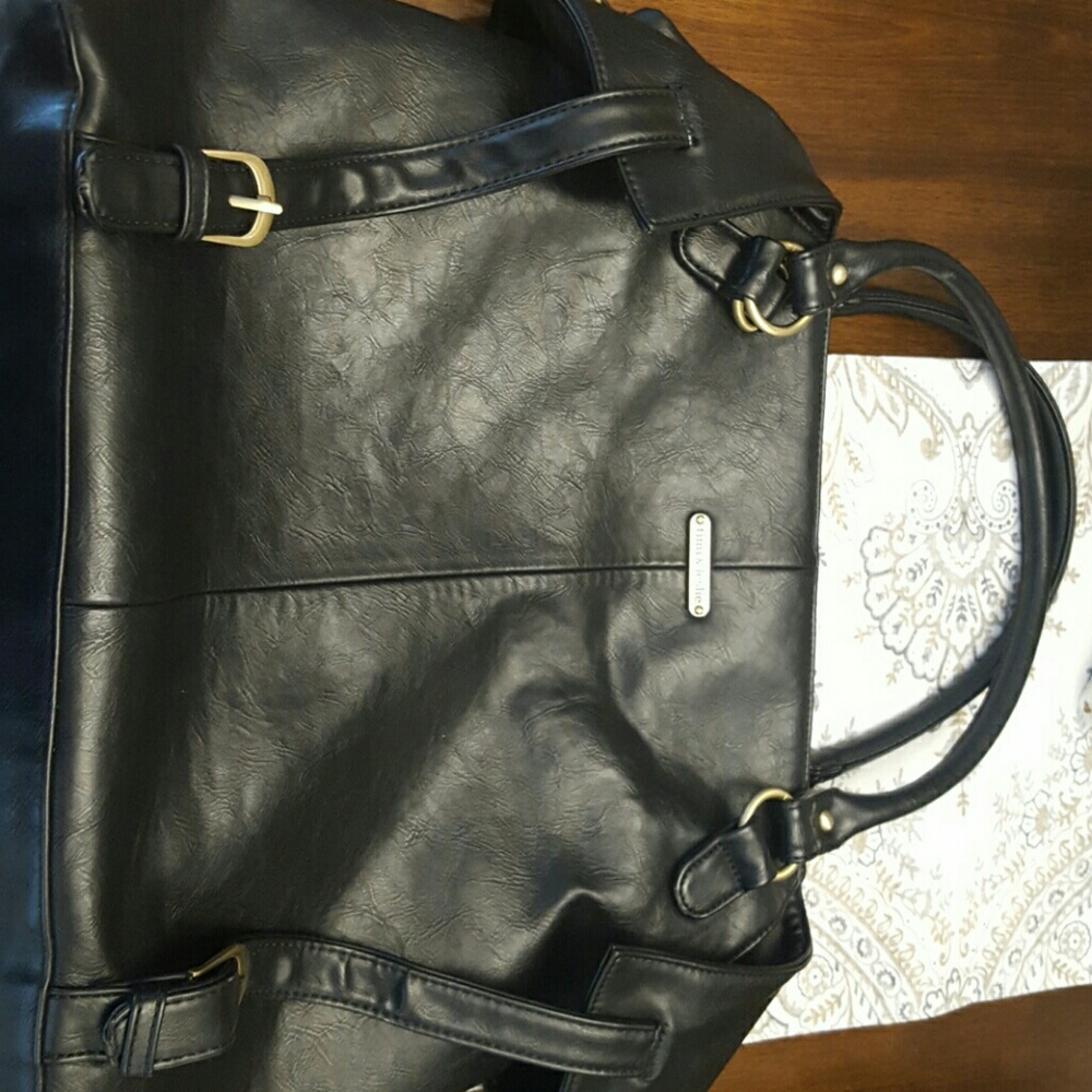 timi and leslie bag