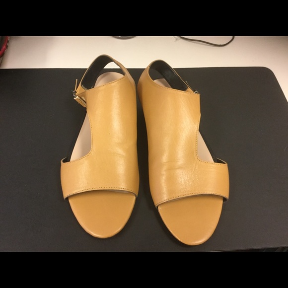 mustard colored flat shoes