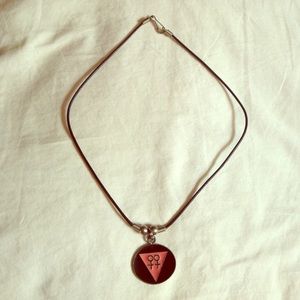 Female symbol necklace