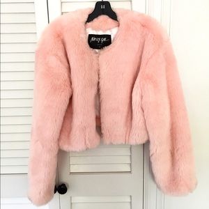 Faux pink fur coat.