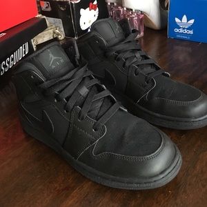Black Jordan 1s Mid