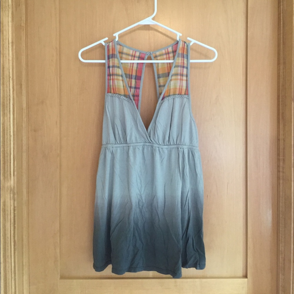 Adorable tank top with low v and cutout back