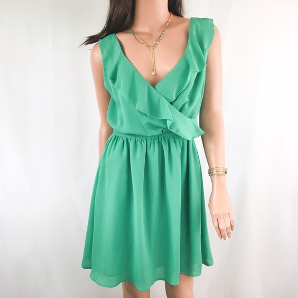 23 off Pink Martini Dresses & Skirts Pink Martini Green Ruffle Cross