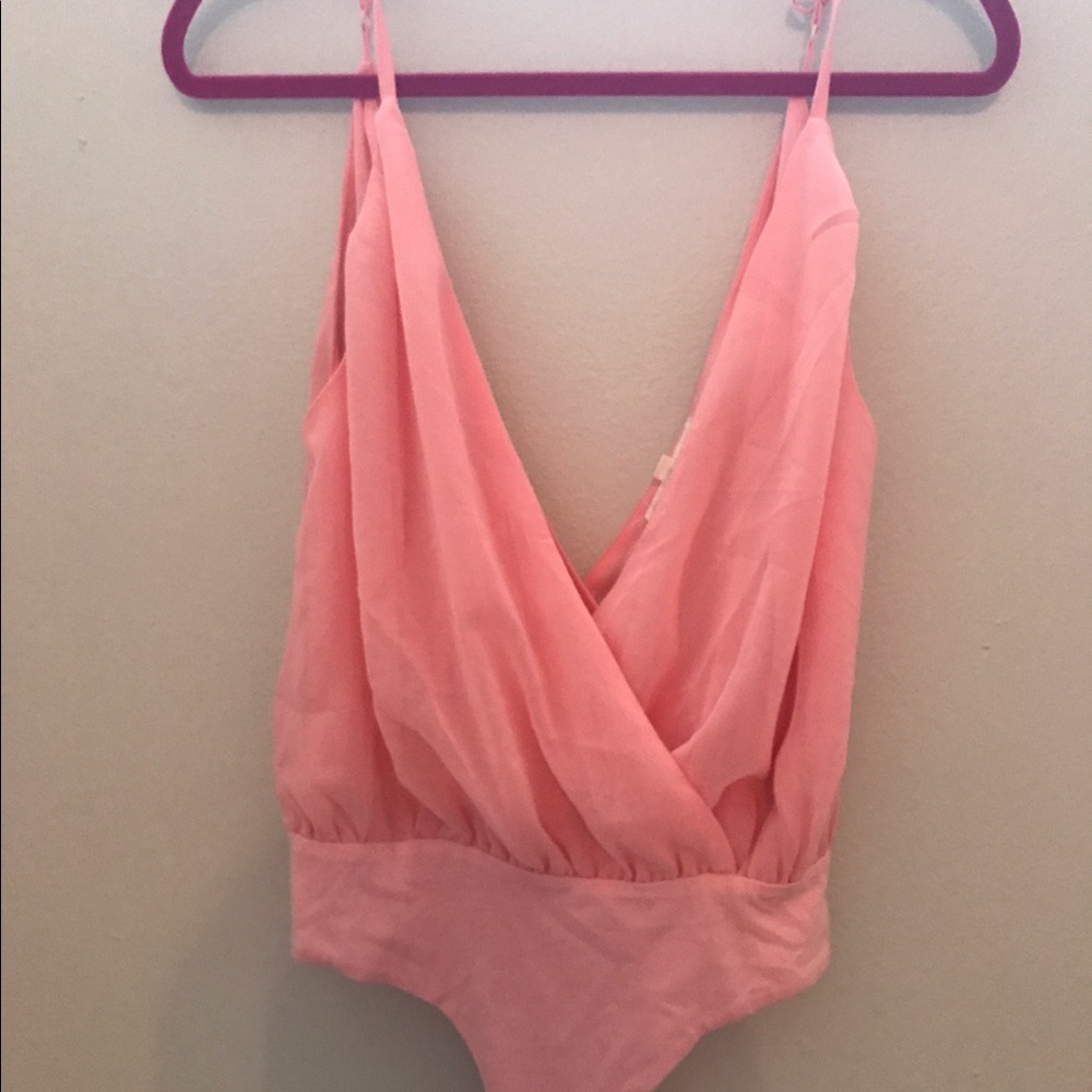 Playful pink bodysuit