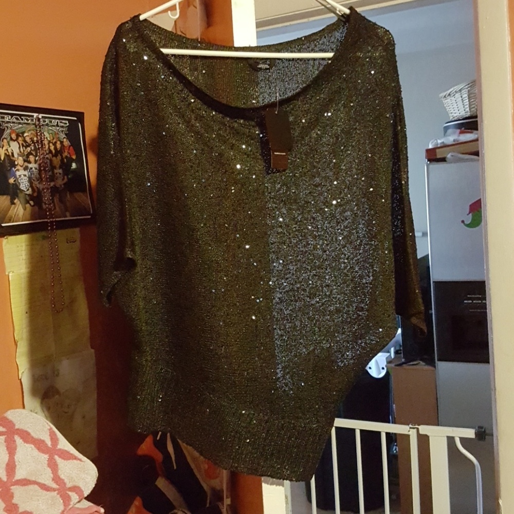 Bebe med. Black sequence blouse