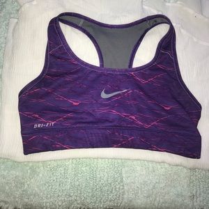 Purple and pink Nike Drifit sports bra