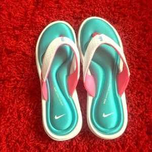 Nike sandals. 💜