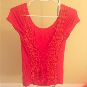 Red short sleeve shirt with lace up back