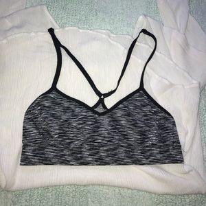 Black and white VS Pink sports bra