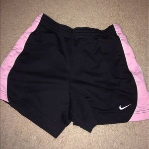 Black and light pink Nike shorts