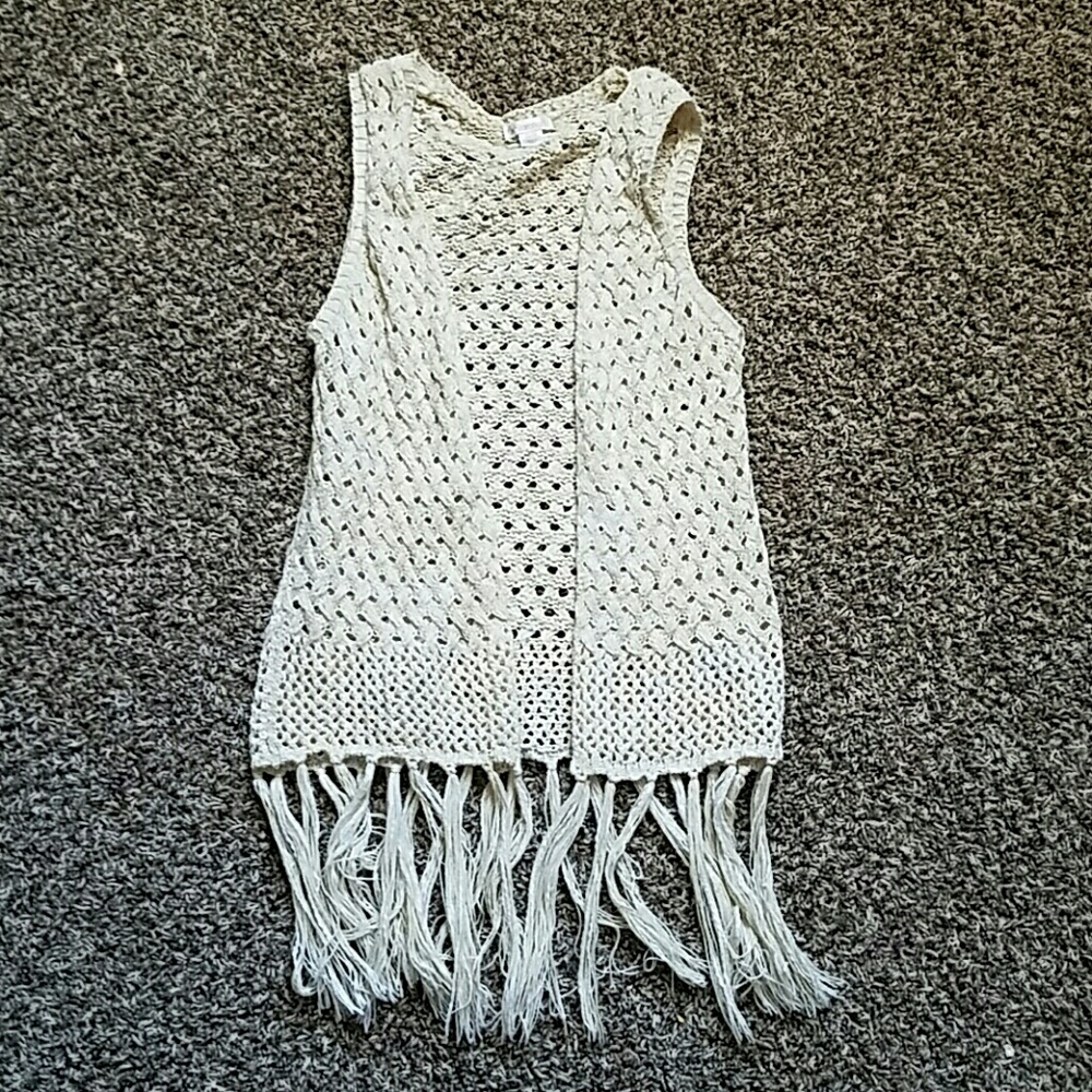 A fringe knit vest