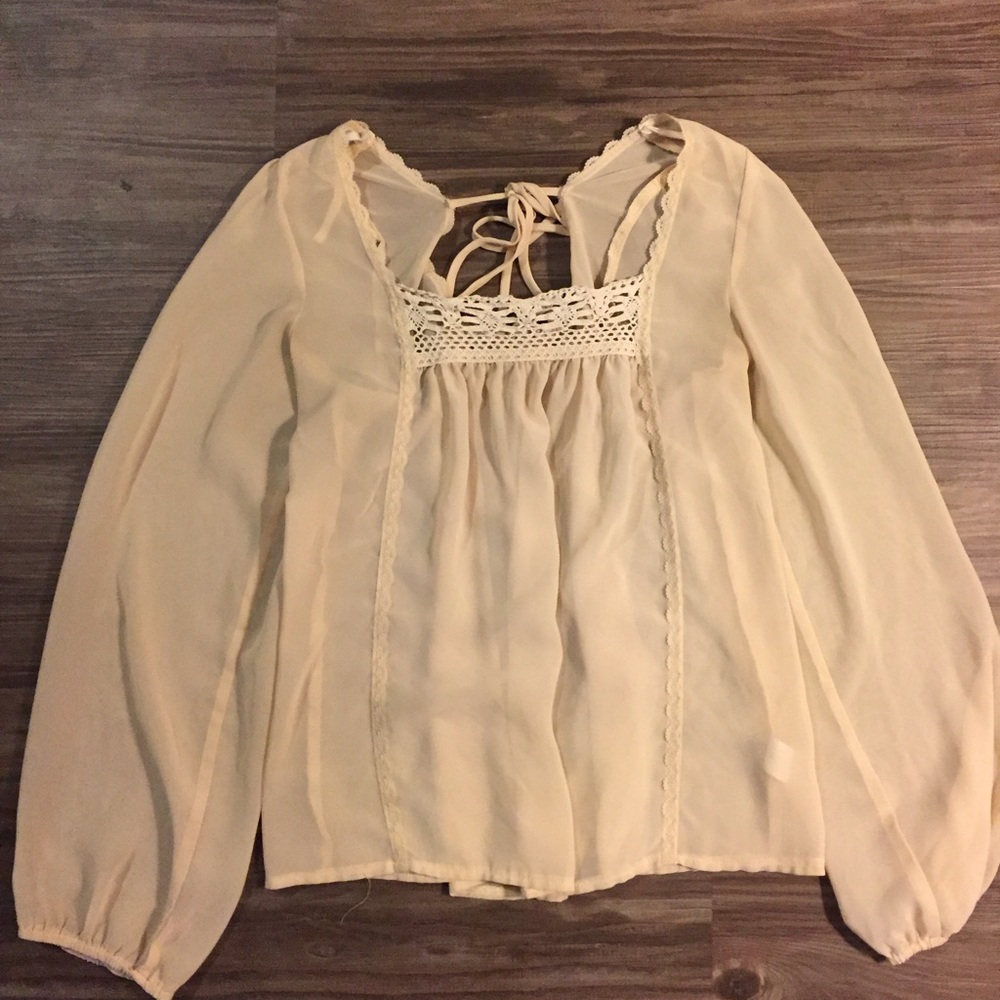 Passing Cream colored peasant top