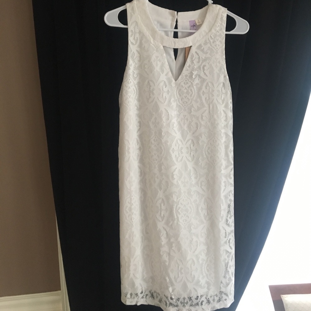 White lace dress with neck cut out