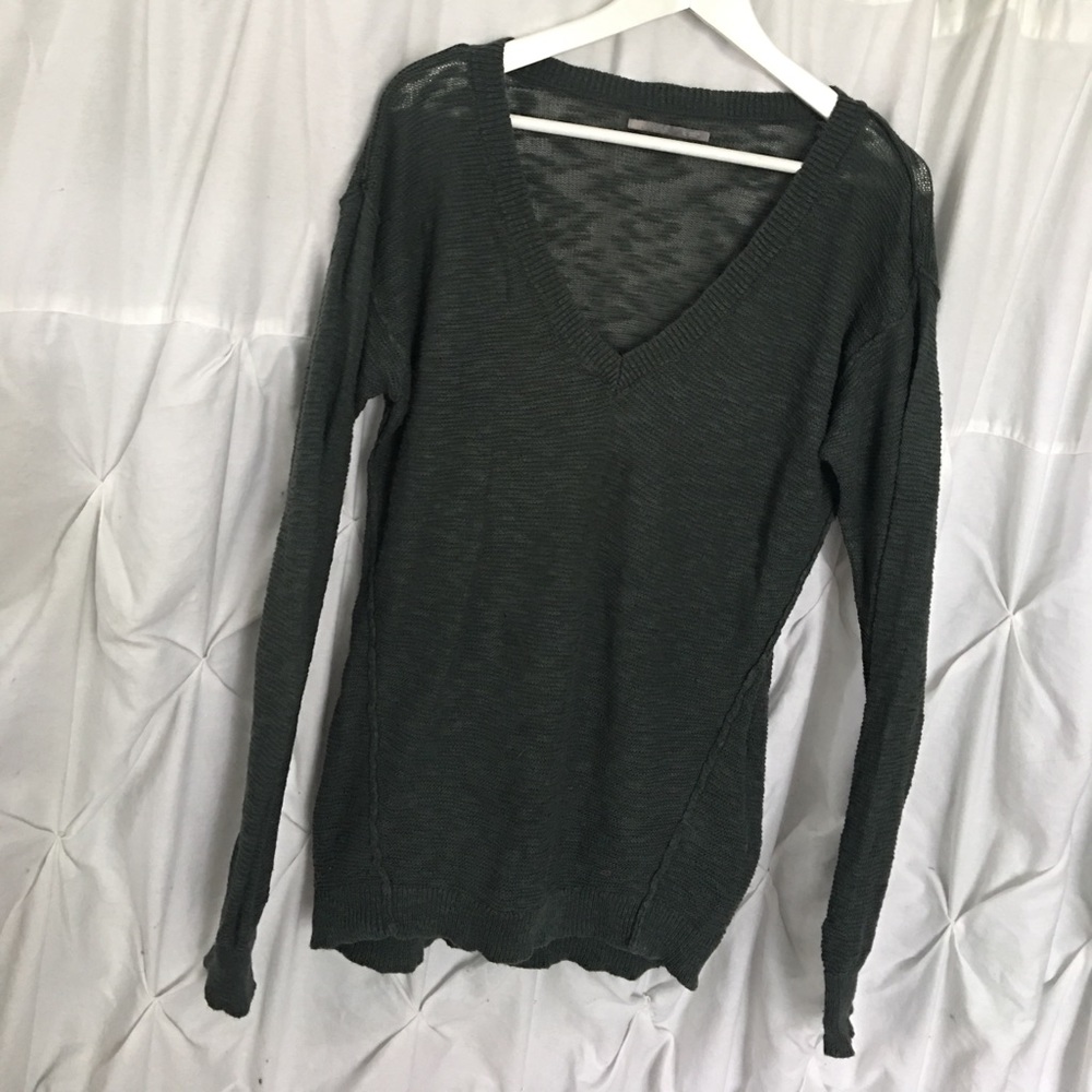 Dark green sweater.