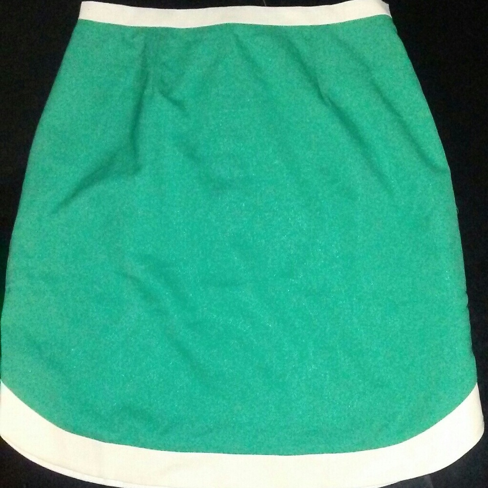 Green skirt with very minor flaws on front.