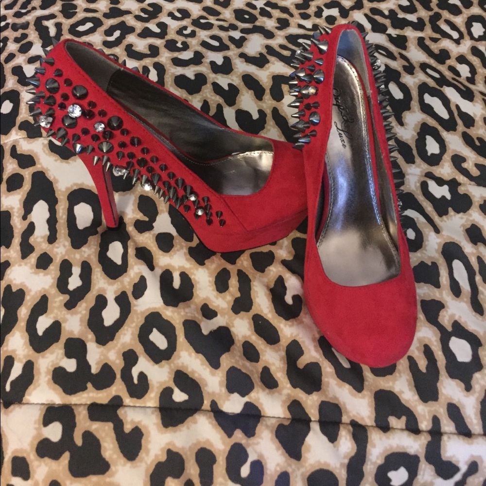 Red spiked heels