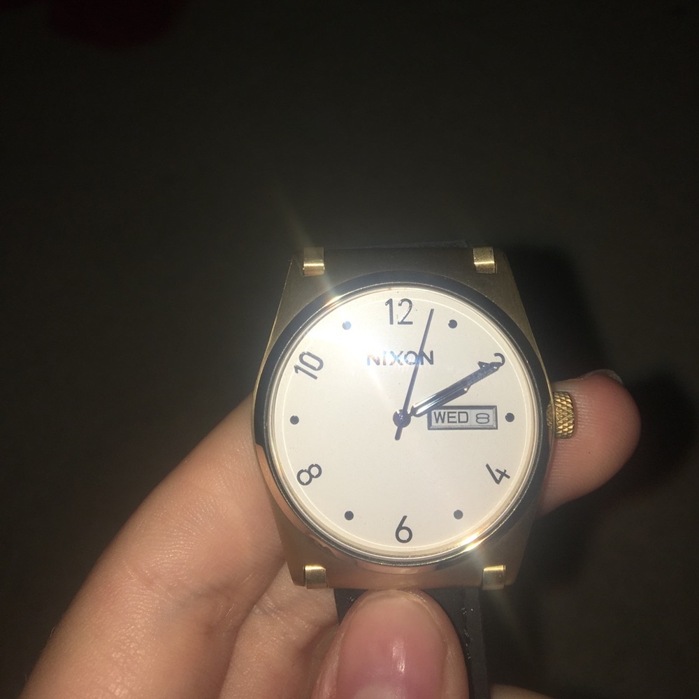 gold nixon watch