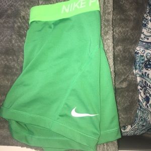 Green Nike pros